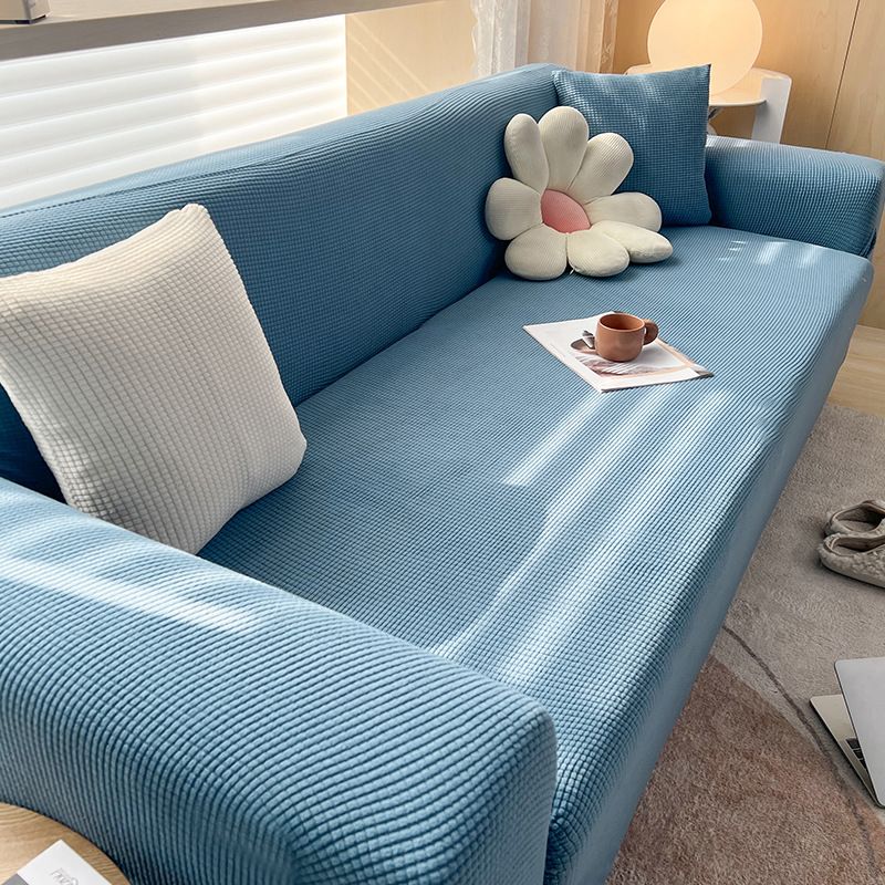 Housse extensible pour canapé et fauteuil