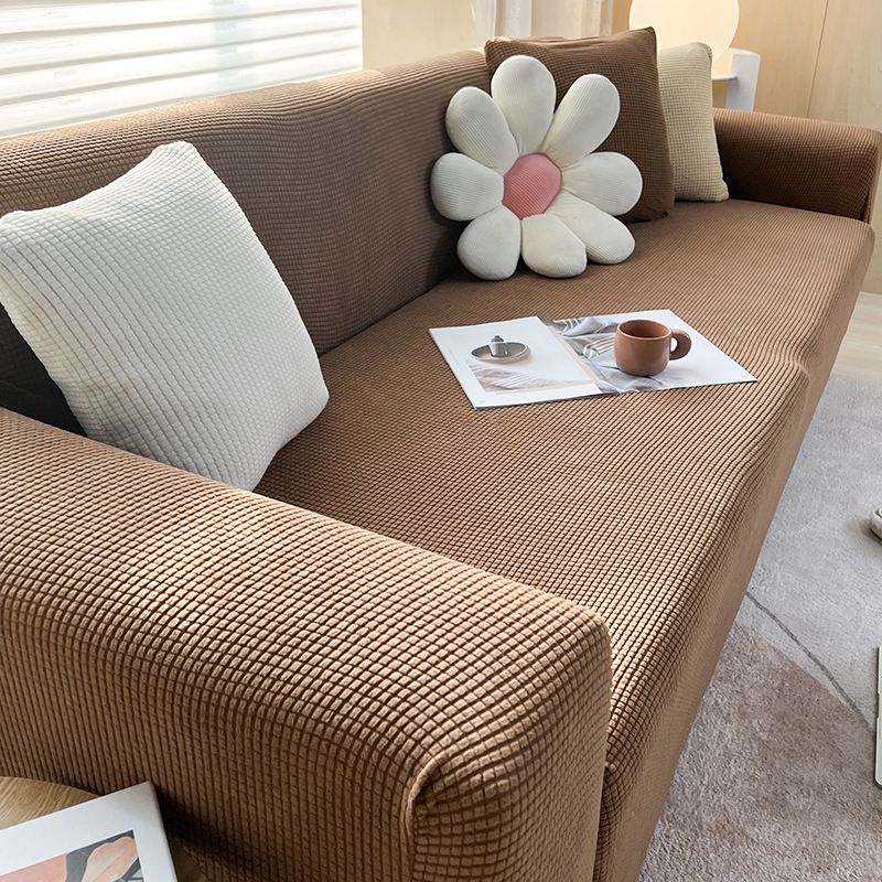 Housse extensible pour canapé et fauteuil
