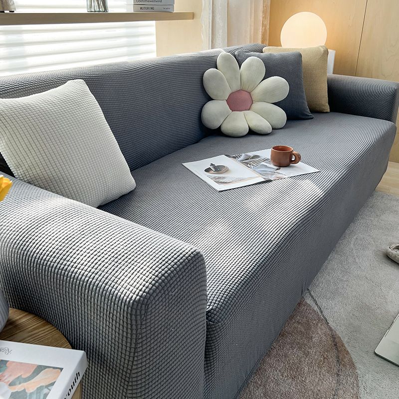 Housse extensible pour canapé et fauteuil