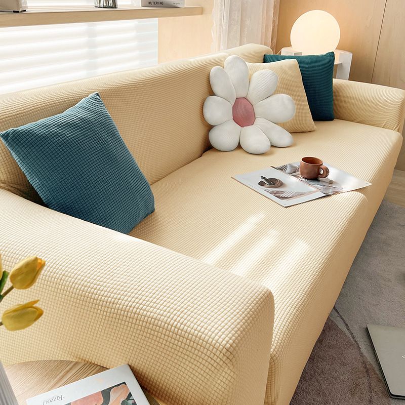 Housse extensible pour canapé et fauteuil