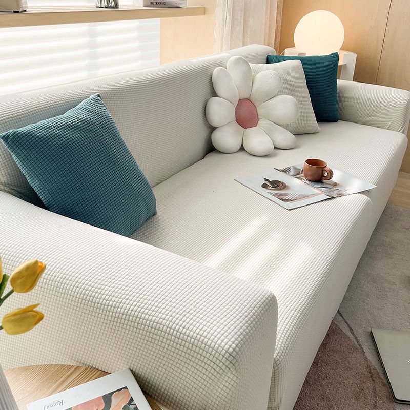 Housse extensible pour canapé et fauteuil