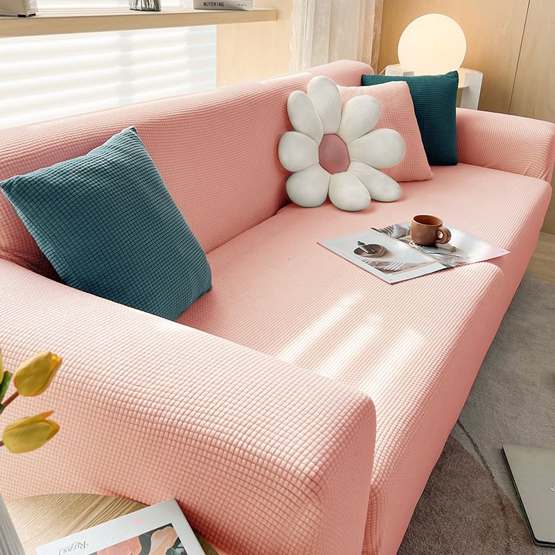 Housse extensible pour canapé et fauteuil