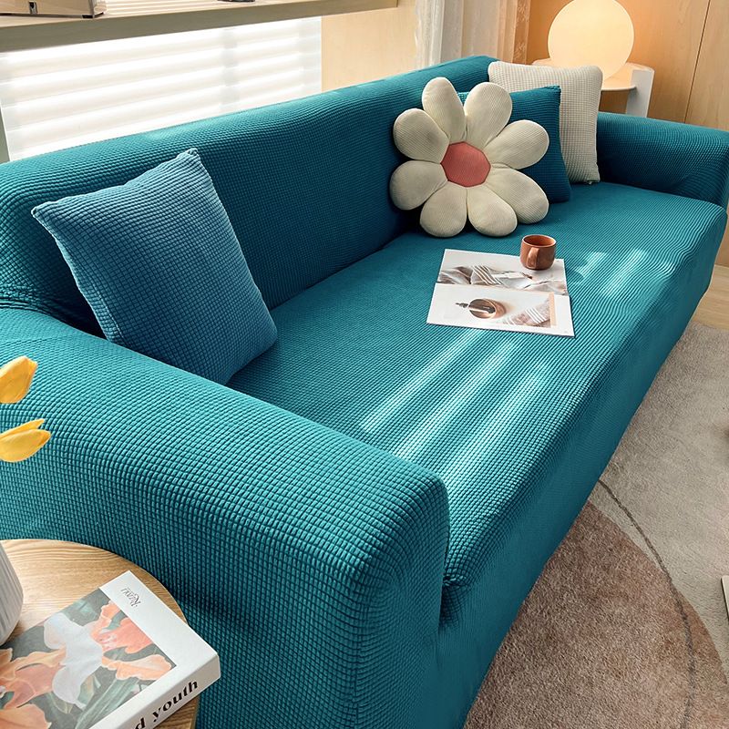 Housse extensible pour canapé et fauteuil