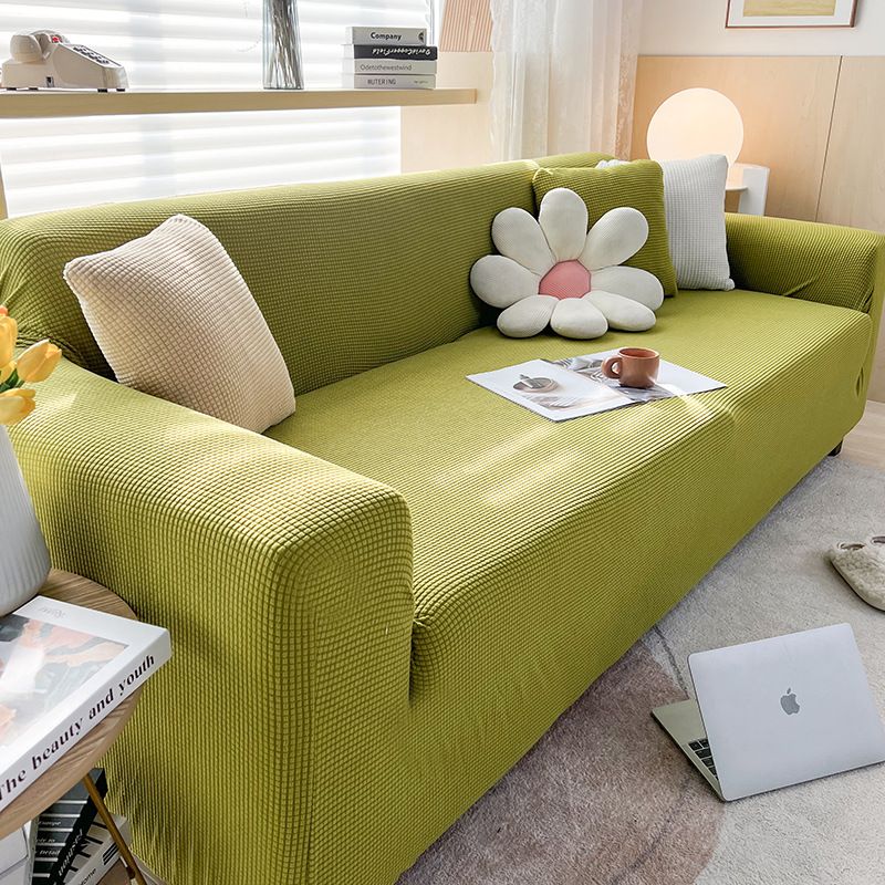 Housse extensible pour canapé et fauteuil