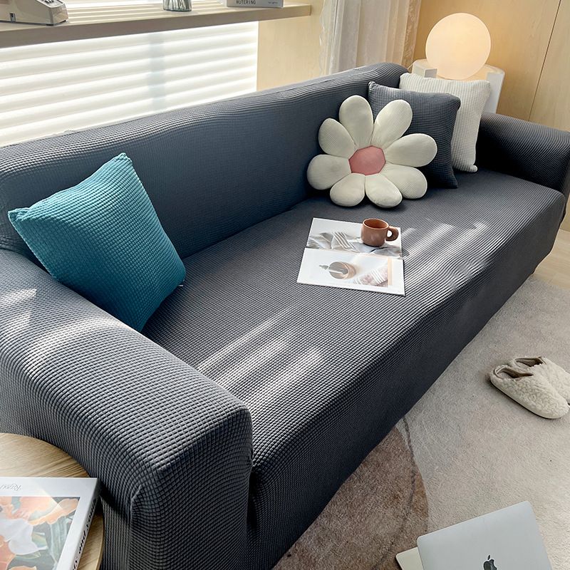 Housse extensible pour canapé et fauteuil
