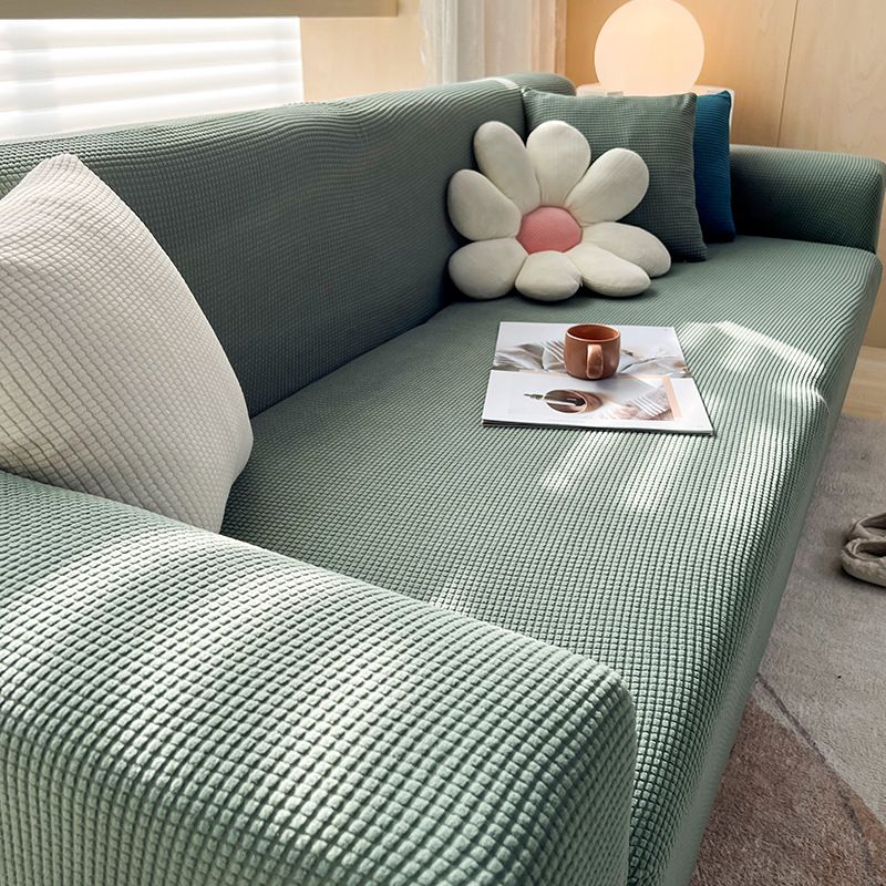 Housse extensible pour canapé et fauteuil