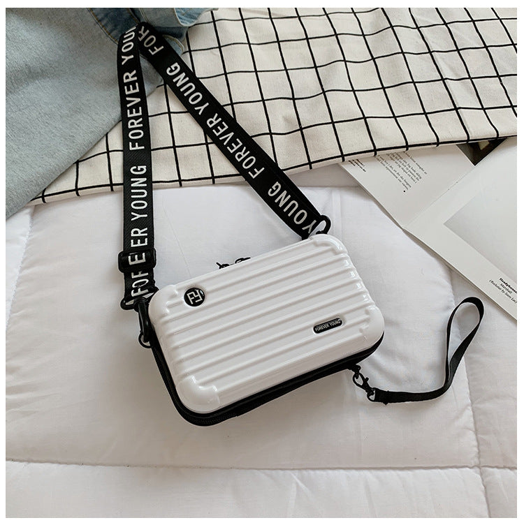 Mini valise forme sac à bandoulière